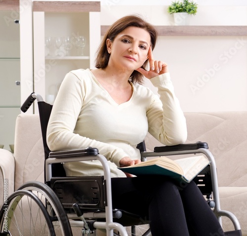 Woman in wheelchair at home