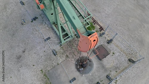 Derrick Device Mining Oil In The Ground. - aerial photo