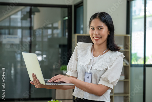Young smiling confident happy employee business woman officer corporate lawyer law firm bookkeeping meeting agenda rates of product taxes in office