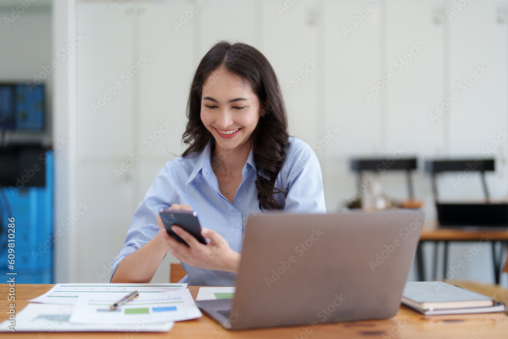 Beautiful Businesswoman completes KYC using an online banking program in order to open a digital savings account. The definition of cyber security Beautiful Businesswoman completes KYC using an online banking program in order to open a digital savings account. The definition of cyber security