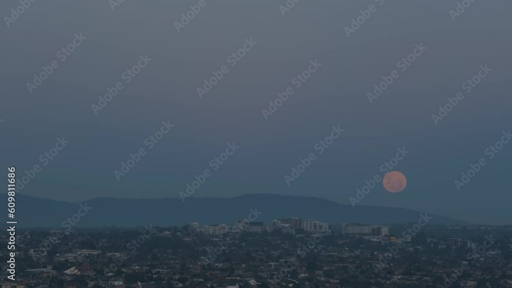 Time Lapse of the moon rising from behind mountains Time Lapse of the moon rising from behind mountains