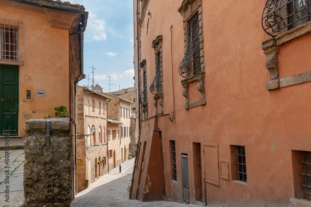 Street and lane-way scene in walled Italian city of Volterra