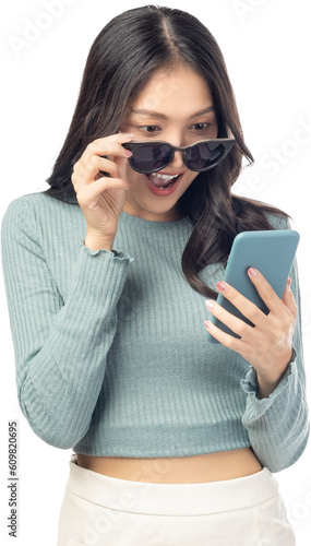 Happy Surprise excited young woman use mobile phone standing over isolated on white background and copy space Young girl using smartphone for shopping online chat and texting message She get surprised