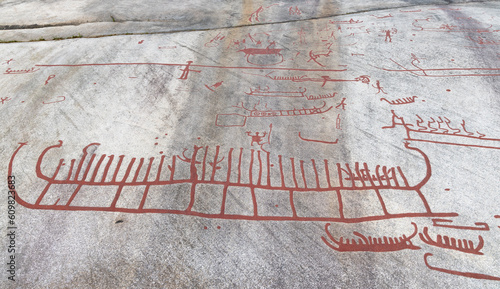 Ancient rock art carvings of large ship in Tanum, Sweden photo