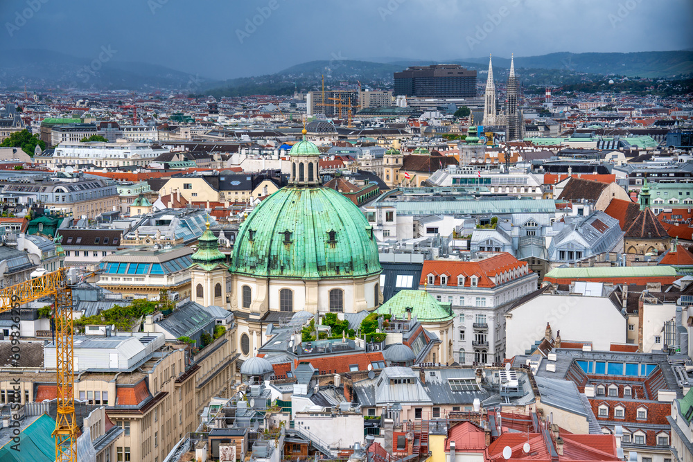 Obraz premium Aerial view of Vienna central buildings on a cloudy summer day, Austria