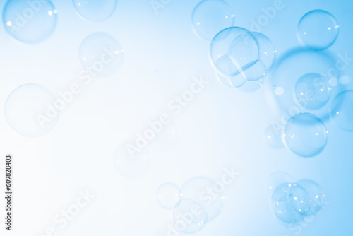 Beautiful Transparent Blue Soap Bubbles Abstract Background. White Blank Space. Celebration Festive Backdrop. Freshness Soap Suds Bubbles Water 