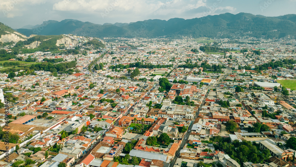 Fototapeta premium Beautiful aerial view of the rooftops of the old colonial buildings in the city of san cristobal de las Casas on the sunset