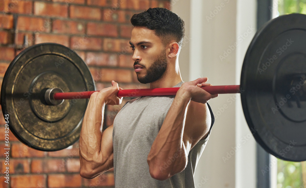 Weightlifting, workout and man with barbell in gym for exercise, bodybuilder training and fitness. Sports, muscles and serious male person lifting weights for wellness, strong body and strength Weightlifting, workout and man with barbell in gym for exercise, bodybuilder training and fitness. Sports, muscles and serious male person lifting weights for wellness, strong body and strength