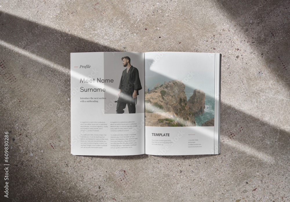 Mockup of open A4 magazine with customizable content against concrete ...