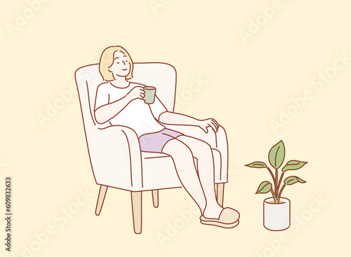 Time to relax. Girl enjoying her Morning Coffee while sitting in sofa. Hand drawn style vector design illustrations.