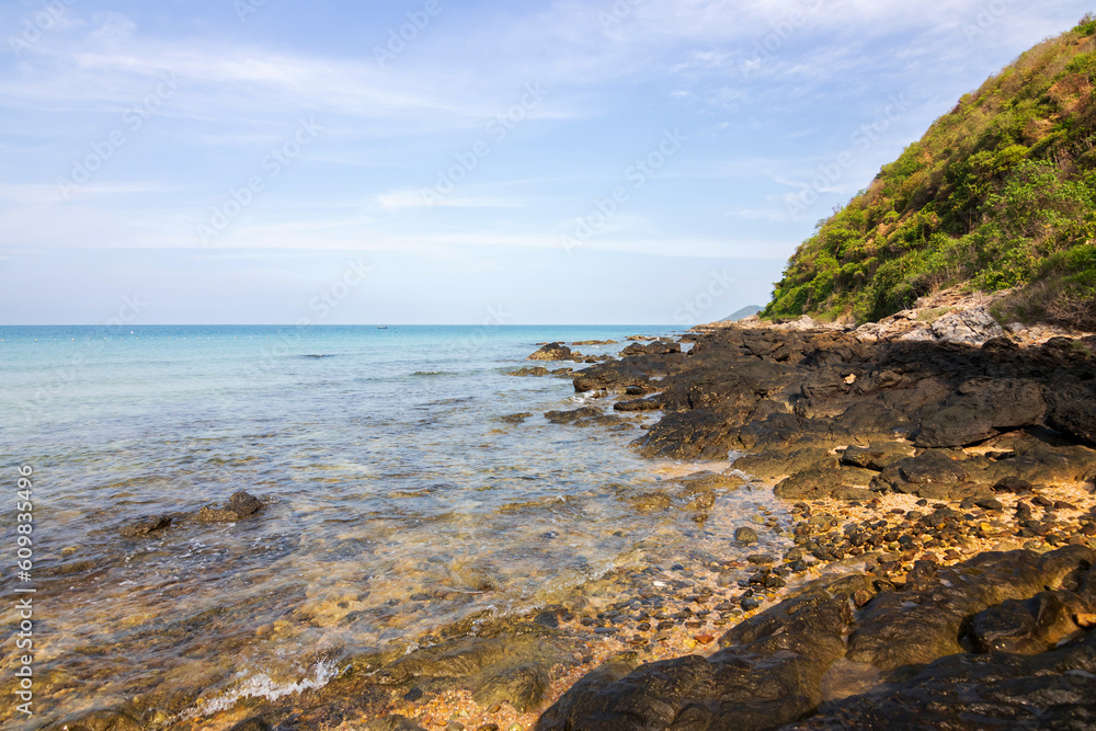 Coast rock stone with beautiful sea background at Ao Prao, Koh Samet - Khao Laem Ya National Park, Rayong, Gulf of Thailand. 