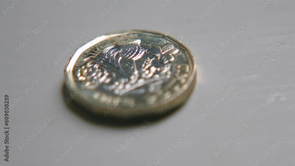 Macro Close Up of British £1 Coin as Camera Pulls Focus Macro Close Up of British £1 Coin as Camera Pulls Focus
