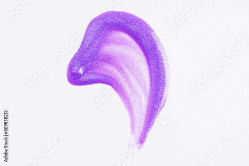 Lilac cosmetic cream smear on white background. Violet beauty cream smear swipe swatch closeup. Lavender face serum, lotion, moisturizer on white. Light purple paint swatch