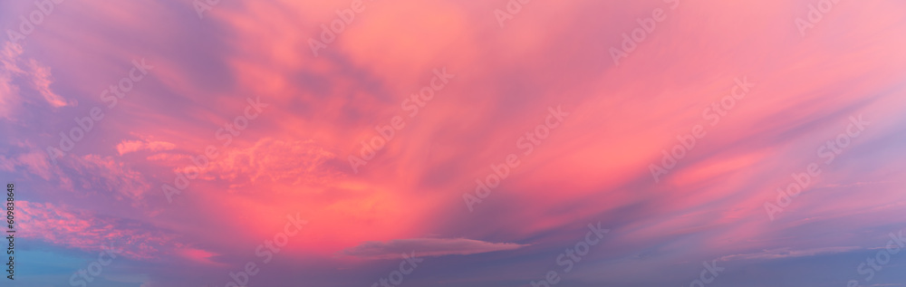 Vibrant panoramic sunset in the clouds