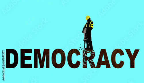 Illustration of construction worker destroying word democracy photo