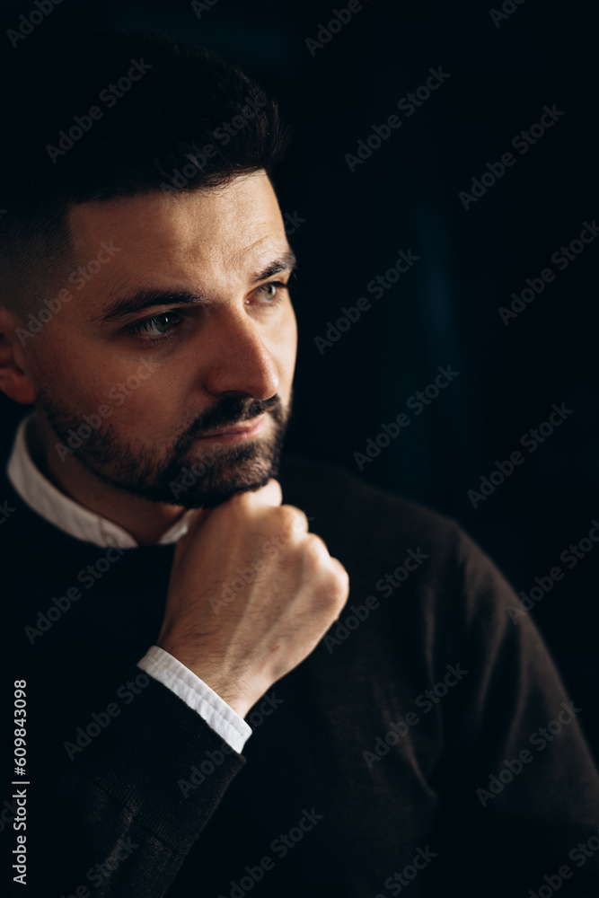 Young man in classy outfit isolated in studio