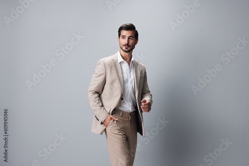 copyspace man suit handsome happy businessman smiling business model portrait beige