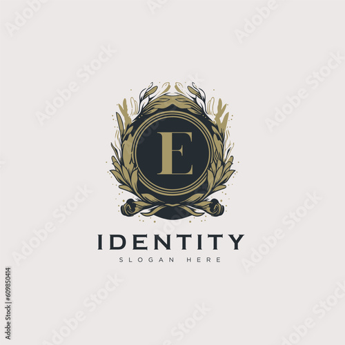 Initial E letter luxury beauty flourishes ornament golden monogram logo art