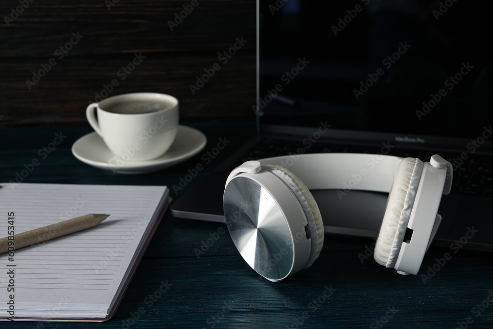 Concept of freelance, composition with hot drink and headphones