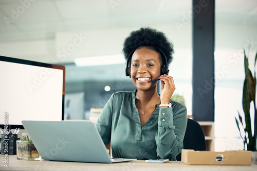 Professional, woman and working in portrait at a call centre at a company with communication with customer. Customer service, female consultant and helping clients for online service at an agency.