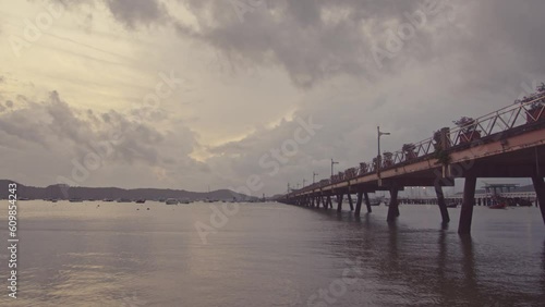 Wallpaper Mural Chalong pier in beautiful sunrise..Natural daylight and rain clouds floating on dark sky..rain clouds in morning sky above Chalong pier..sky texture background.. Torontodigital.ca
