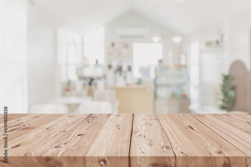 Wood table on blur coffee shop background clean bright light foreground Mock up for montage products display Wood table on blur coffee shop background clean bright light foreground Mock up for montage products display