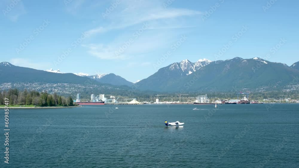 people with backpacks in sneakers walk along embankment in port cars taxi buses shining sun life is in full swing Canada 2023 people with backpacks in sneakers walk along embankment in port cars taxi buses shining sun life is in full swing Canada 2023