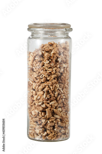 Transparent jar with lid with dried walnuts. Transparent background.
