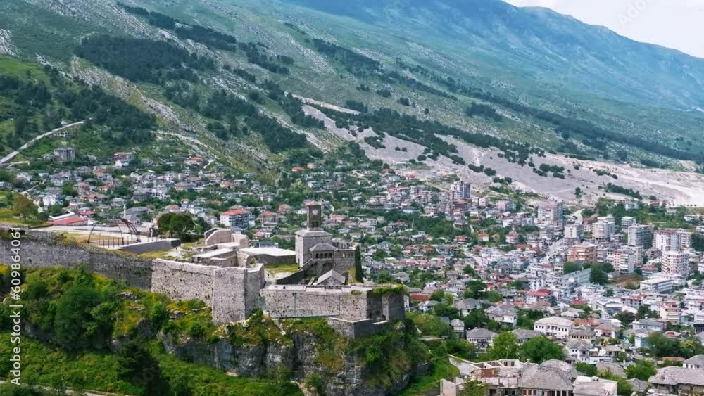 Aerial drone view of old quarters of Gjirokaster, Albania. Traditional houses in the old city of Gjirokaster. UNESCO World Heritage Site. Aerial drone view of old quarters of Gjirokaster, Albania. Traditional houses in the old city of Gjirokaster. UNESCO World Heritage Site.