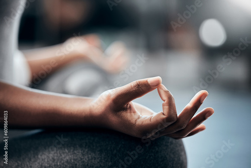 Slika na platnu Yoga in gym, hands or woman in meditation in lotus pose with zen peace or mindfulness in blurry studio
