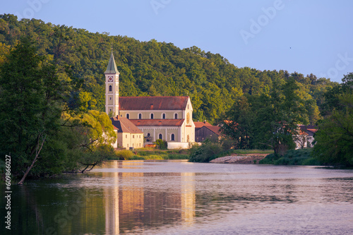 The church St. Bartholomäus of the village Zeitlarn near Regensburg, Bavaria on the river Regen in afternoon sunlight photo