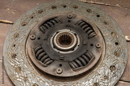 Disassembled clutch disc of a car in a car service repair shop © Cliff