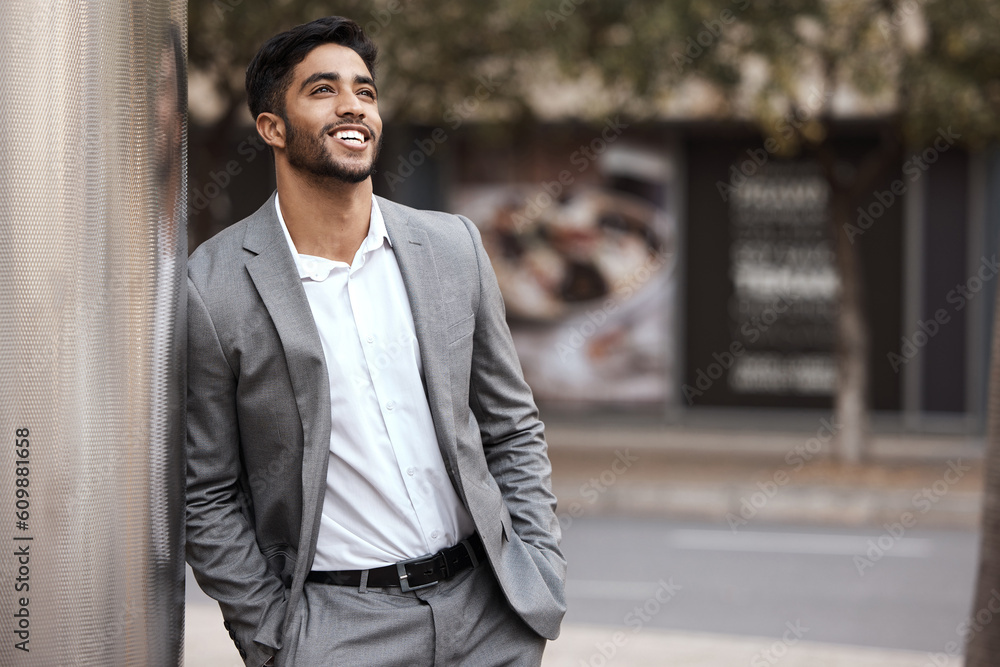 Thinking, happy and a businessman in the city on a wall for ideas, planning and a vision. Smile, corporate and a man in a suit in town for ideas, a plan or professional happiness for business Thinking, happy and a businessman in the city on a wall for ideas, planning and a vision. Smile, corporate and a man in a suit in town for ideas, a plan or professional happiness for business