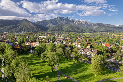Aerial view of Zakopane town with Tatra mountains range in summer, Poland.