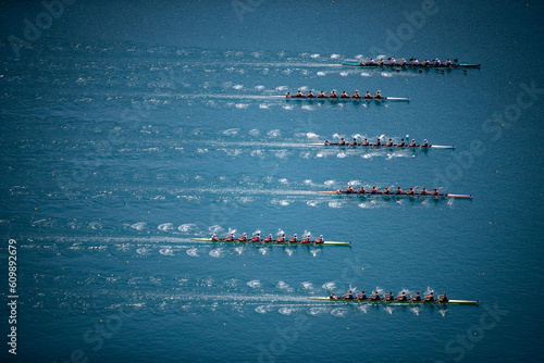Men's Eight rowing boats rowing on Lake Bled