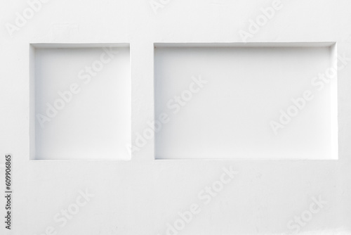background of white wall with indentation in plastered wall forming a natural rack photo