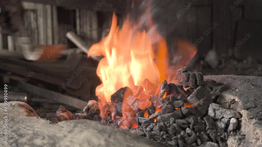 indian blacksmith close up in rural environment blacksmith makes metal utensils using hammer and anvil indian blacksmith close up in rural environment blacksmith makes metal utensils using hammer and anvil