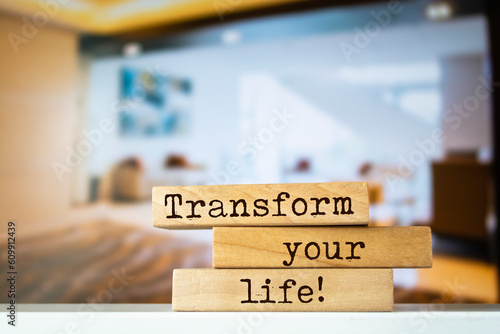 Wooden blocks with words 'Transform your life'