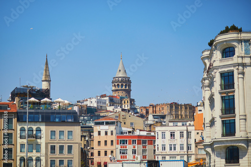 Cityscape with Galata tower and city roofs in Istanbul photo