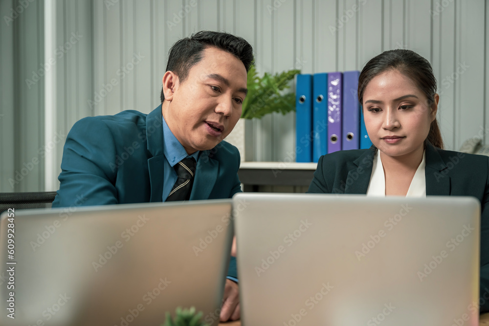 Modern Asian businessman with high confidence Committed to working together as a harmonious team Having a professional planning meeting at the company Modern Asian businessman with high confidence Committed to working together as a harmonious team Having a professional planning meeting at the company