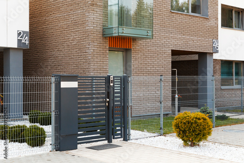 Video intercom on the gate at the entrance to the residential area.