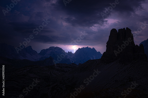 Thunder storm atmosphere viewed from Sextner Stein on Toblinger Knoten mountain range in the evening. Tre Cime, Dolomites, South Tirol, Italy, Europe.