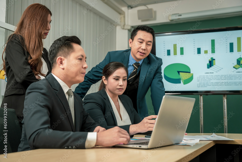 Modern Asian businessman with high confidence Committed to working together as a harmonious team Having a professional planning meeting at the company Modern Asian businessman with high confidence Committed to working together as a harmonious team Having a professional planning meeting at the company