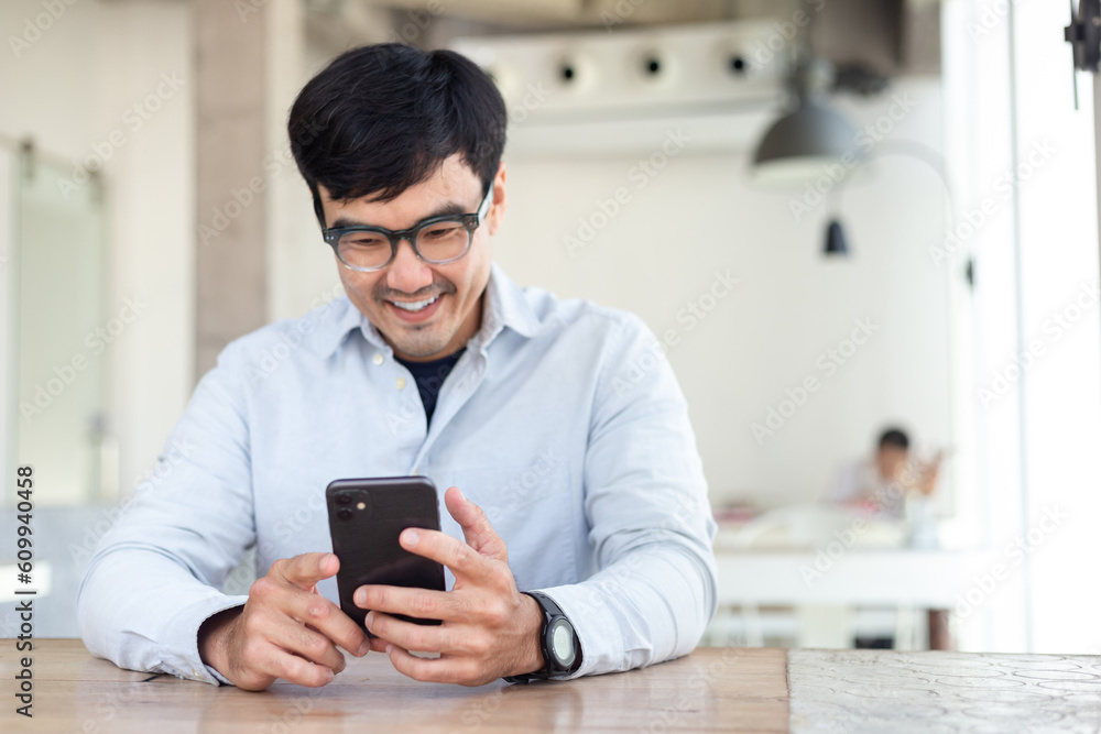 man using cell phone hand holding mobile texting message contact us.chatting,search internet information.technology device communication connecting man using cell phone hand holding mobile texting message contact us.chatting,search internet information.technology device communication connecting