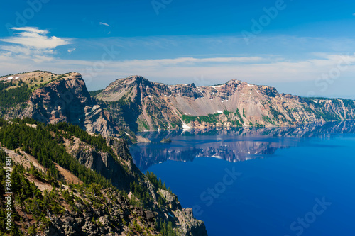 Phantom ship and Reflections of the mountains  in Crater Lake  Oregon  USA