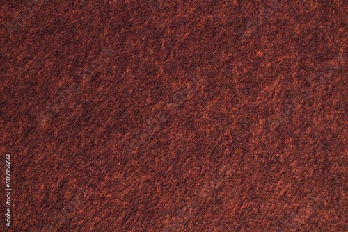 Soft brown felt texture material background. Surface of fabric wool material for handmade creative. Scrapbooking, felting item. Natural rough textile fiber pattern