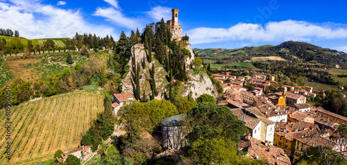 one of the most beautiful medieval villages of Italy, Emilia romagna region- Brisighella in Ravenna province, panoramic view of the castle and clock tower photo