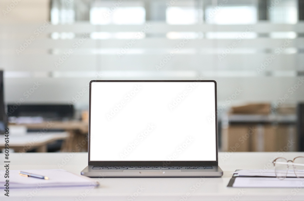 Laptop device mock up template design on office workplace desk, white mockup empty blank computer screen on office work table business web technology at modern workspace, closeup. Laptop device mock up template design on office workplace desk, white mockup empty blank computer screen on office work table business web technology at modern workspace, closeup.