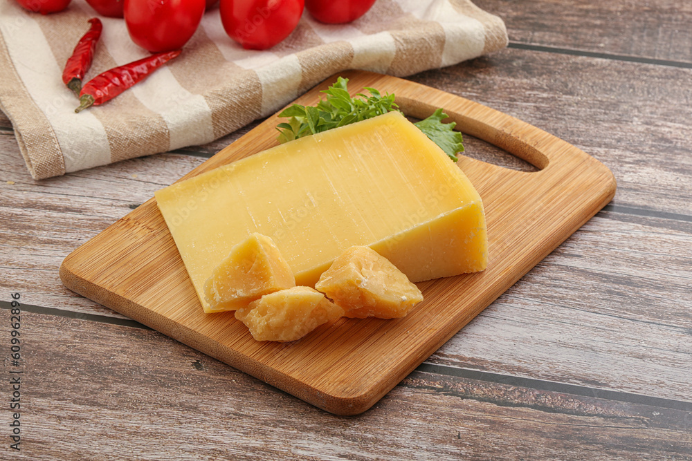 Parmesan hard cheese with small pieces Parmesan hard cheese with small pieces