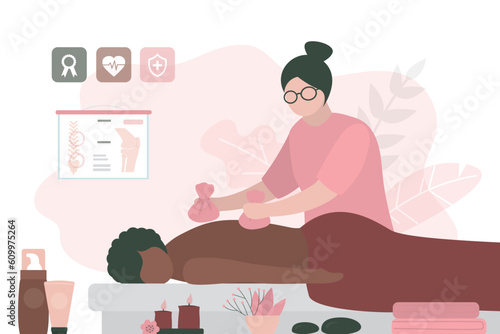 Relaxed woman getting back massage in spa with professional massage therapist. Wellness, healing and relaxation concept. Young adult lying and masseur massaging her body.